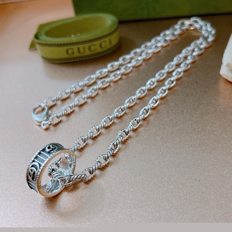 G*u*i necklaces